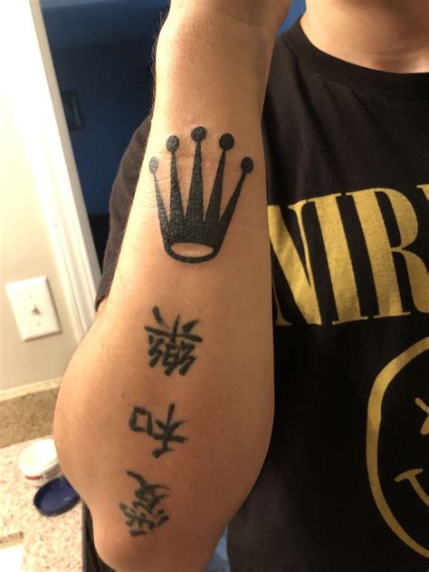 neck rolex crown tattoo